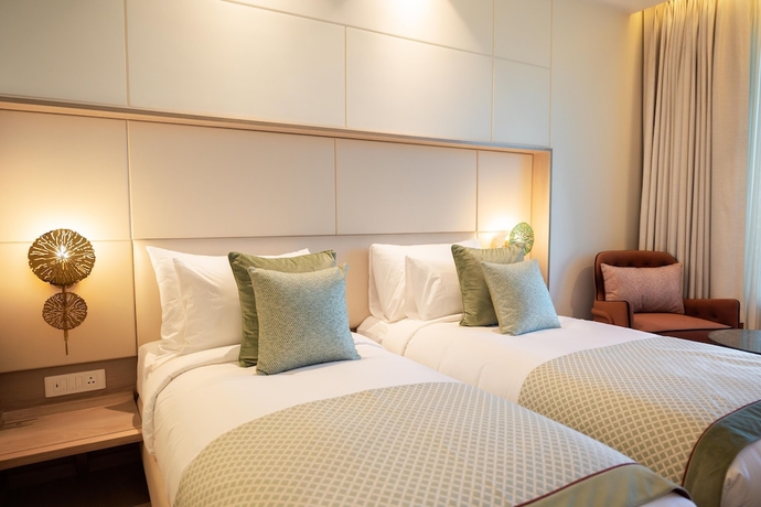 Imagen de la habitación del Hotel The Greenwood Guwahati. Foto 8