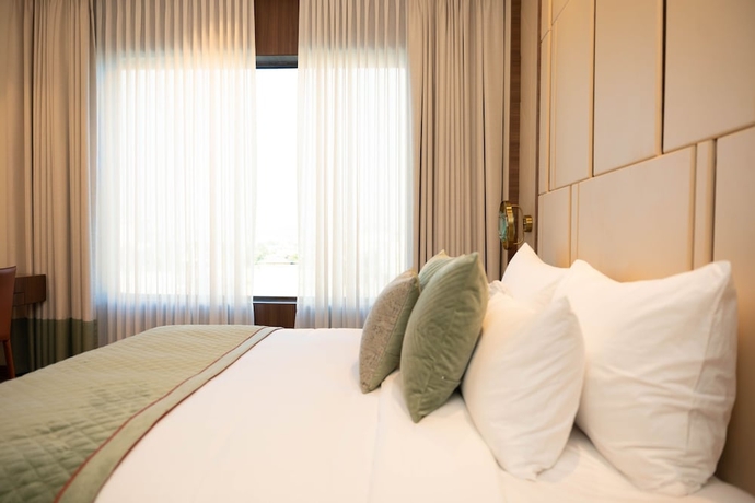 Imagen de la habitación del Hotel The Greenwood Guwahati. Foto 10