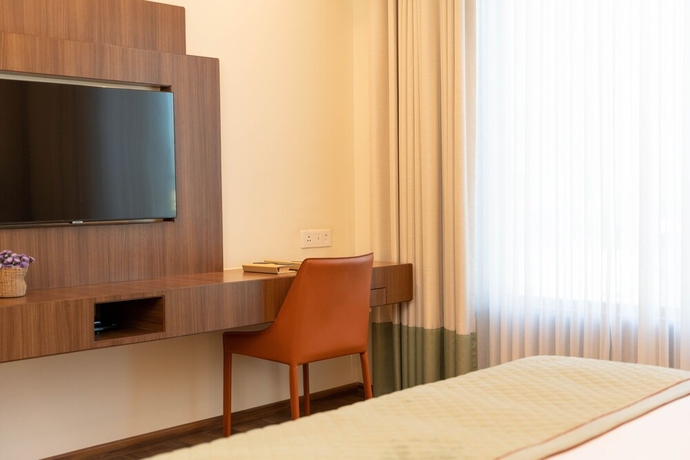 Imagen de la habitación del Hotel The Greenwood Guwahati. Foto 13