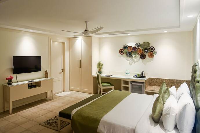 Imagen de la habitación del Hotel The Greenwood Resort, Guwahati. Foto 11