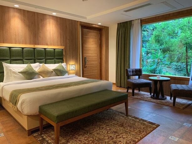 Imagen de la habitación del Hotel The Greenwood Resort, Guwahati. Foto 15