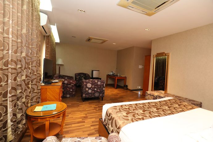 Imagen de la habitación del Hotel The Greenwood Tezpur. Foto 2