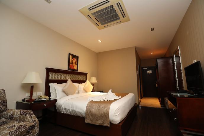 Imagen de la habitación del Hotel The Greenwood Tezpur. Foto 8