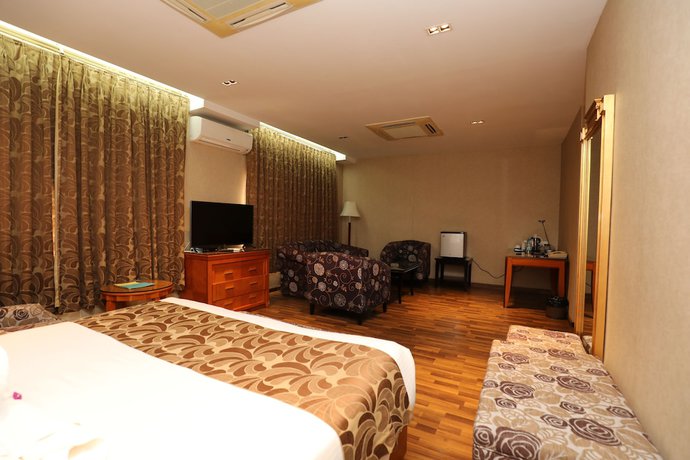 Imagen de la habitación del Hotel The Greenwood Tezpur. Foto 10