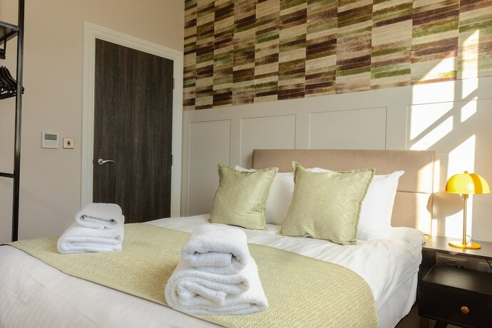 Imagen de la habitación del Hotel The Gresham Aparthotel. Foto 19