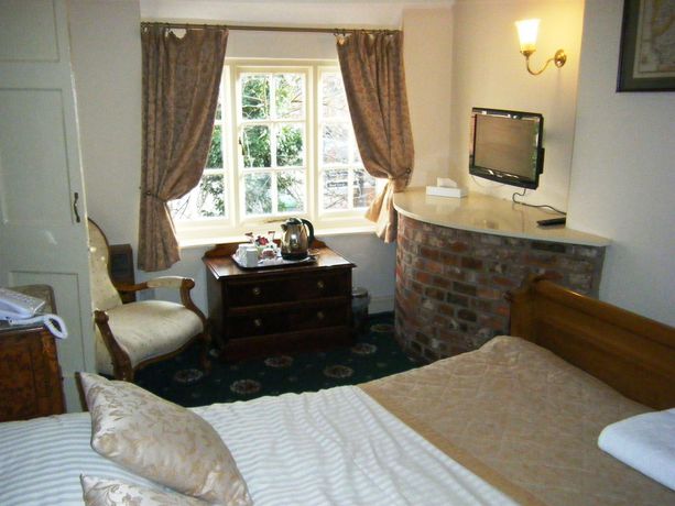 Imagen de la habitación del Hotel The Greyhound Coaching Inn. Foto 7