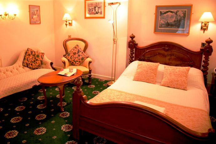 Imagen de la habitación del Hotel The Greyhound Coaching Inn. Foto 13