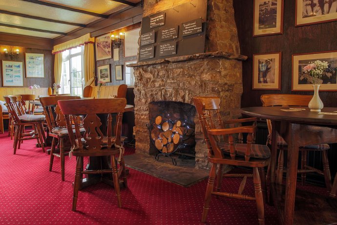 Imagen del bar/restaurante del Hotel The Greyhound Inn and. Foto 3