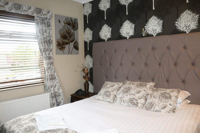 Imagen de la habitación del Hotel The Griffin Inn. Foto 6