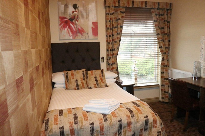 Imagen de la habitación del Hotel The Griffin Inn. Foto 7