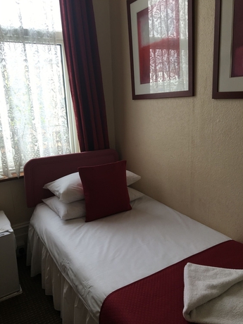 Imagen de la habitación del Hotel The Grosvenor House. Foto 9