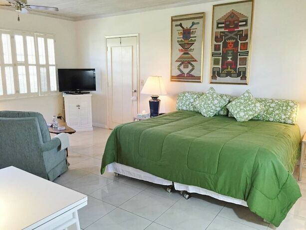 Imagen de la habitación del Hotel The Grove Beach Condominiums. Foto 19