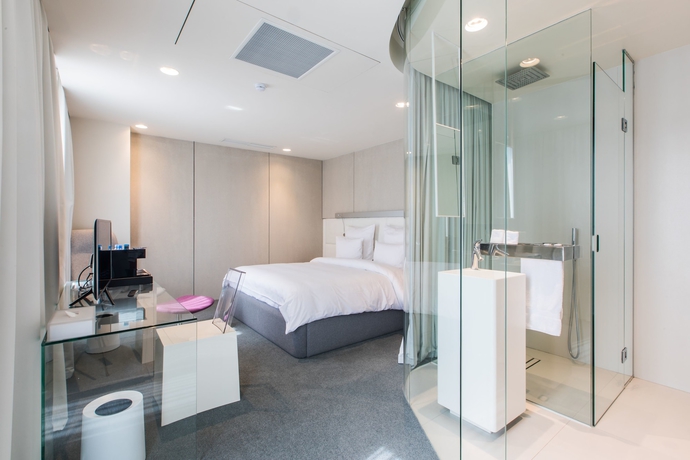 Imagen de la habitación del Hotel The Grove Design. Foto 10