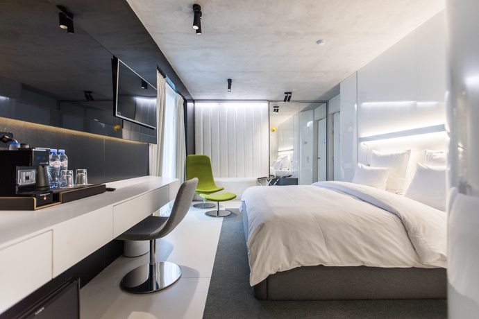 Imagen de la habitación del Hotel The Grove Design. Foto 17