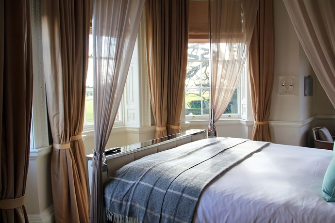 Imagen de la habitación del Hotel The Grove. Foto 5