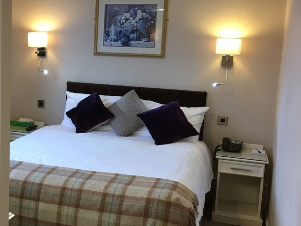 Imagen de la habitación del Hotel The Grove House. Foto 13