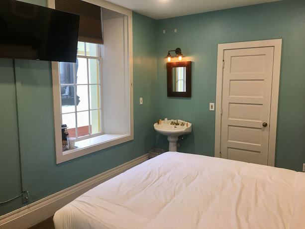 Imagen de la habitación del Hotel The Groveland. Foto 9