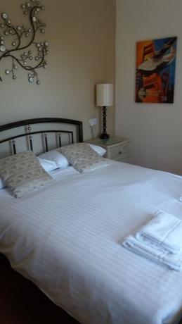 Imagen de la habitación del Hotel The Groveside Guest House. Foto 4