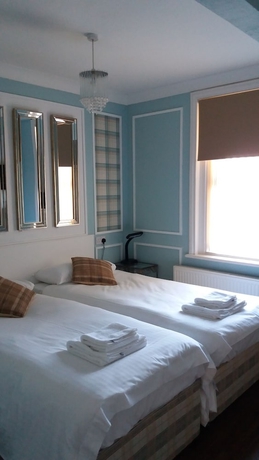 Imagen de la habitación del Hotel The Groveside Guest House. Foto 7
