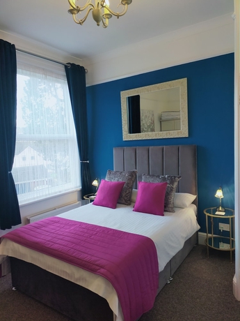 Imagen de la habitación del Hotel The Groveside Guest House. Foto 11