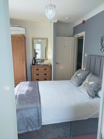 Imagen de la habitación del Hotel The Groveside Guest House. Foto 12