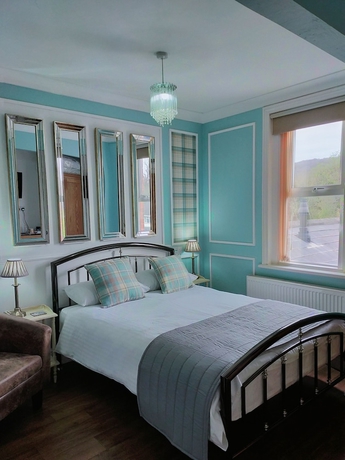 Imagen de la habitación del Hotel The Groveside Guest House. Foto 14