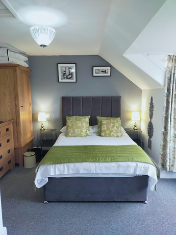 Imagen de la habitación del Hotel The Groveside Guest House. Foto 16