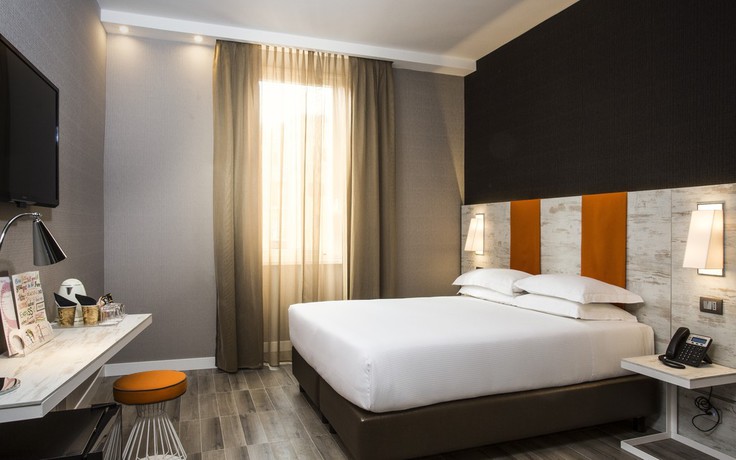 Imagen de la habitación del Hotel The Guardian. Foto 16