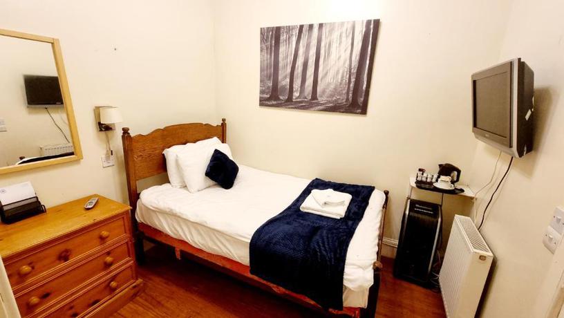Imagen de la habitación del Hotel The Guards. Foto 10