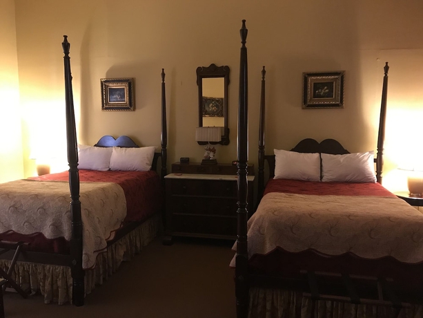 Imagen de la habitación del Hotel The Guest House Historic Mansion. Foto 6
