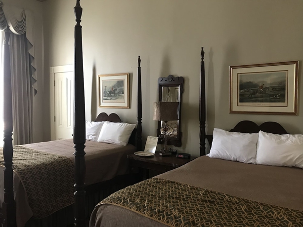 Imagen de la habitación del Hotel The Guest House Historic Mansion. Foto 10