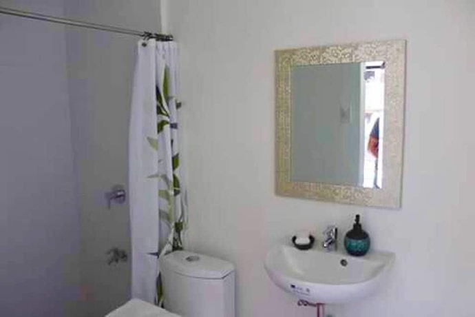 Imagen de la habitación del Hotel The Guest House Laoag. Foto 2