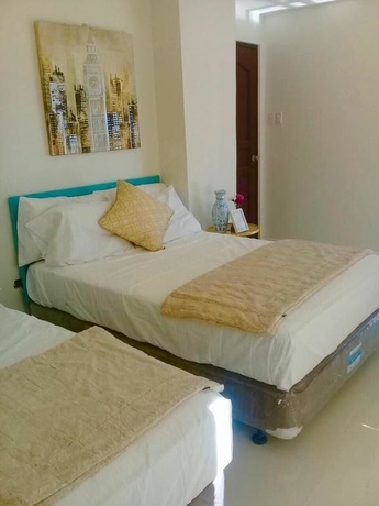 Imagen de la habitación del Hotel The Guest House Laoag. Foto 5