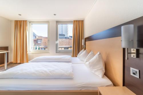 Imagen de la habitación del Hotel The Guesthouse. Foto 5