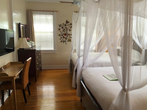 Imagen de la habitación del Hotel The Guesthouses at Southernmost Beach Resort. Foto 12
