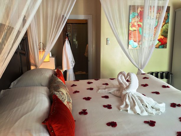 Imagen de la habitación del Hotel The Guesthouses at Southernmost Beach Resort. Foto 19