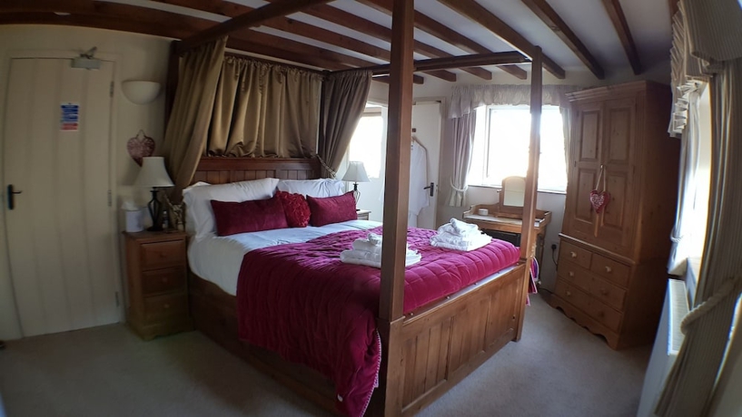 Imagen de la habitación del Hotel The Guiting Guest House. Foto 8