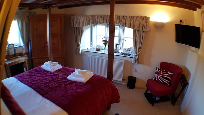 Imagen de la habitación del Hotel The Guiting Guest House. Foto 9