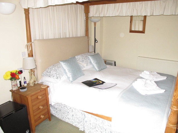 Imagen de la habitación del Hotel The Guiting Guest House. Foto 10