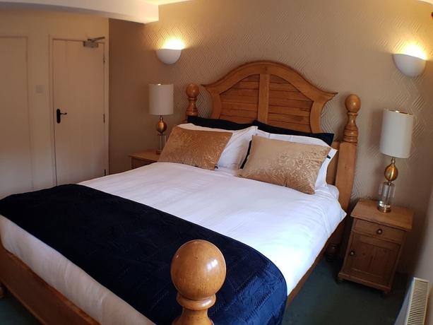 Imagen de la habitación del Hotel The Guiting Guest House. Foto 13
