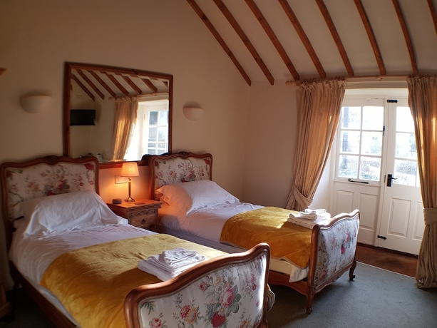 Imagen de la habitación del Hotel The Guiting Guest House. Foto 14