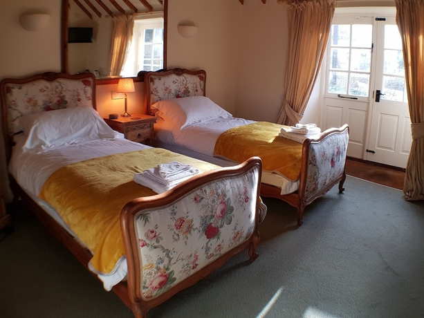 Imagen de la habitación del Hotel The Guiting Guest House. Foto 15