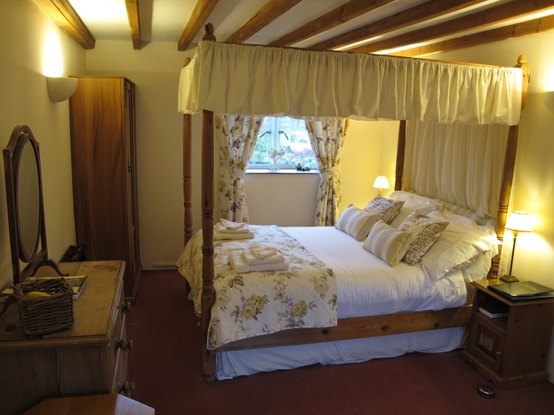 Imagen de la habitación del Hotel The Guiting Guest House. Foto 16