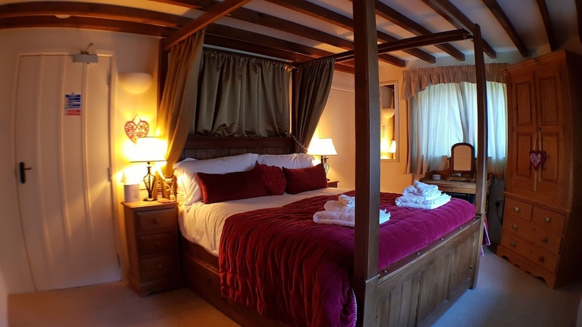 Imagen de la habitación del Hotel The Guiting Guest House. Foto 18