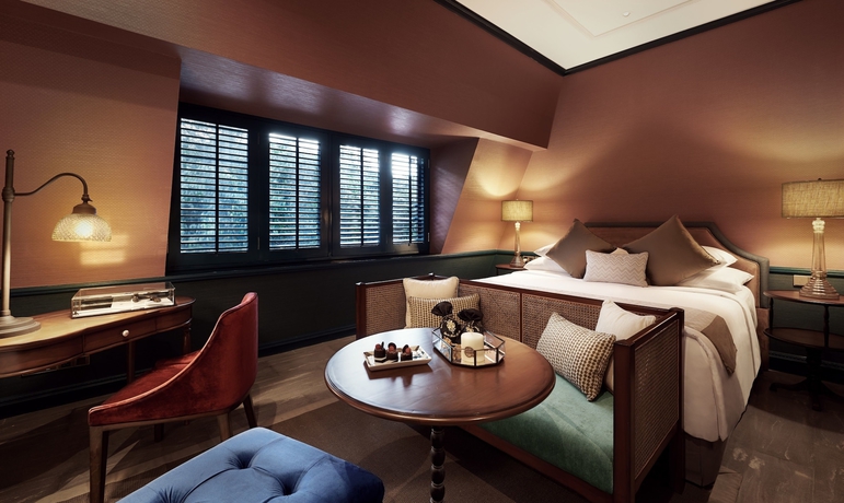 Imagen de la habitación del Hotel The Gunawarman. Foto 7