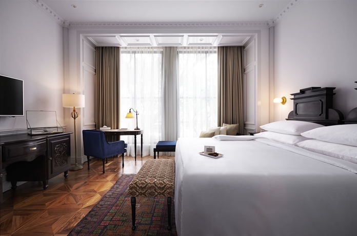 Imagen de la habitación del Hotel The Gunawarman. Foto 8