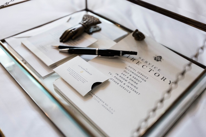 Imagen de la habitación del Hotel The Gunawarman. Foto 16