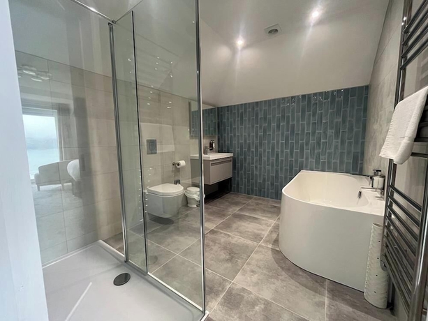 Imagen de la habitación del Hotel The Gwbert. Foto 6