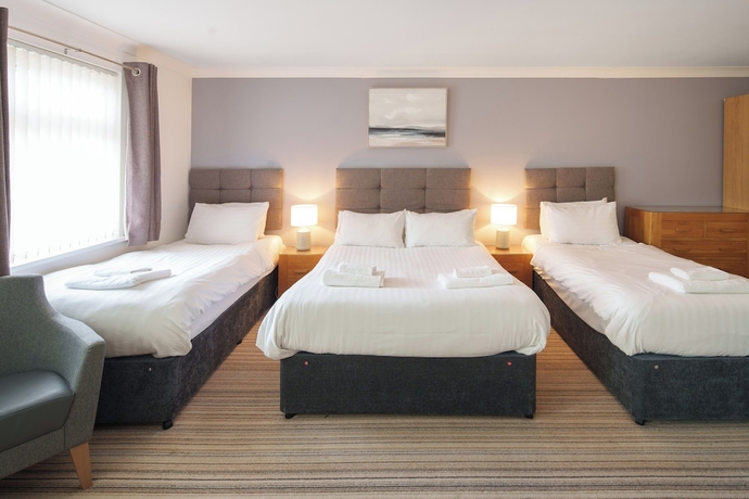 Imagen de la habitación del Hotel The Gwbert. Foto 11