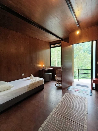 Imagen de la habitación del Hotel The HIJAU Camp and Cabin. Foto 1